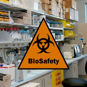 "Biosafety" and biohazard logo superimposed on a picture of a laboratory workspace